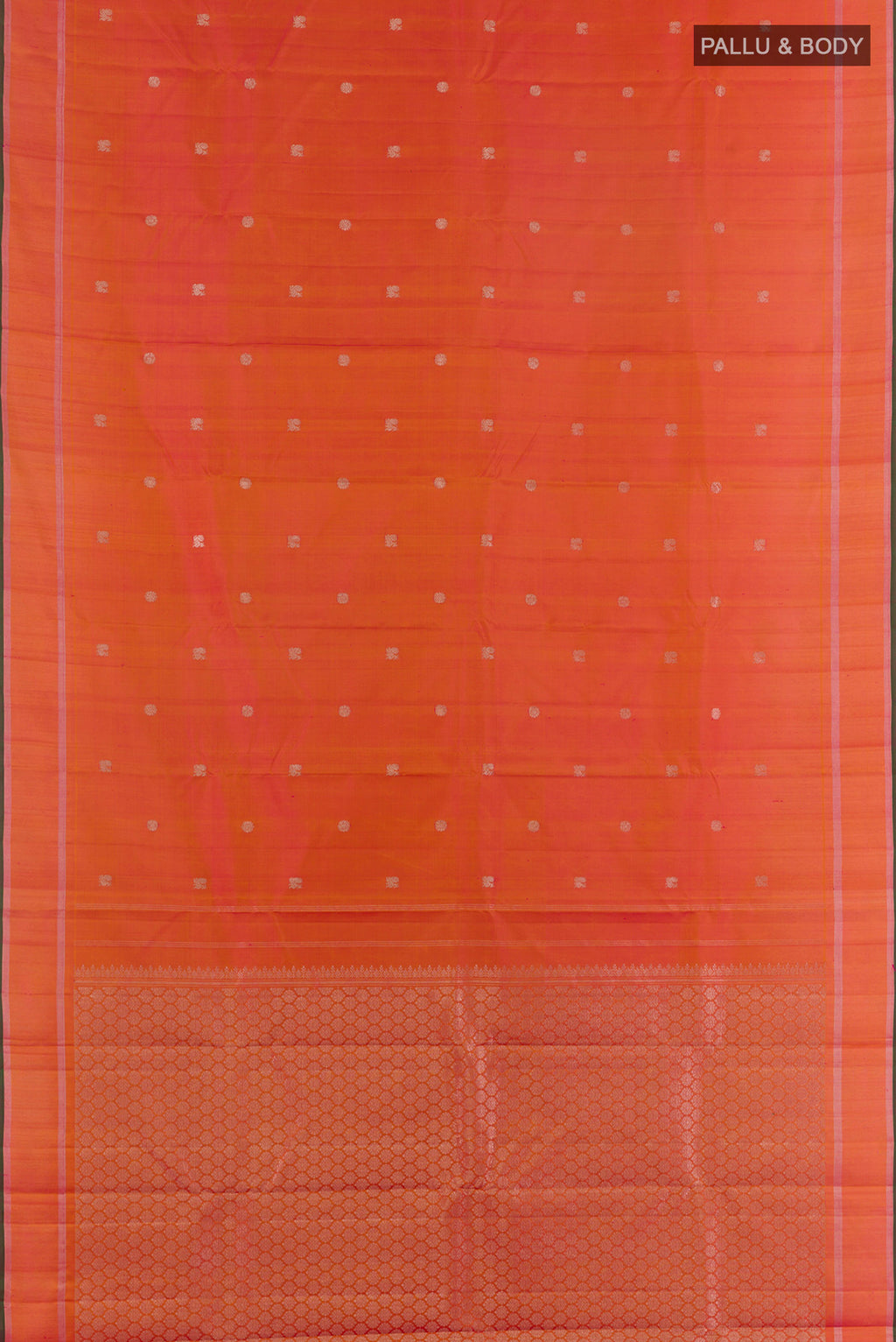 Flat view of Pure Silk Brick Orange Kanchipuram Saree with Zari Butta on the body and Zari Border. 