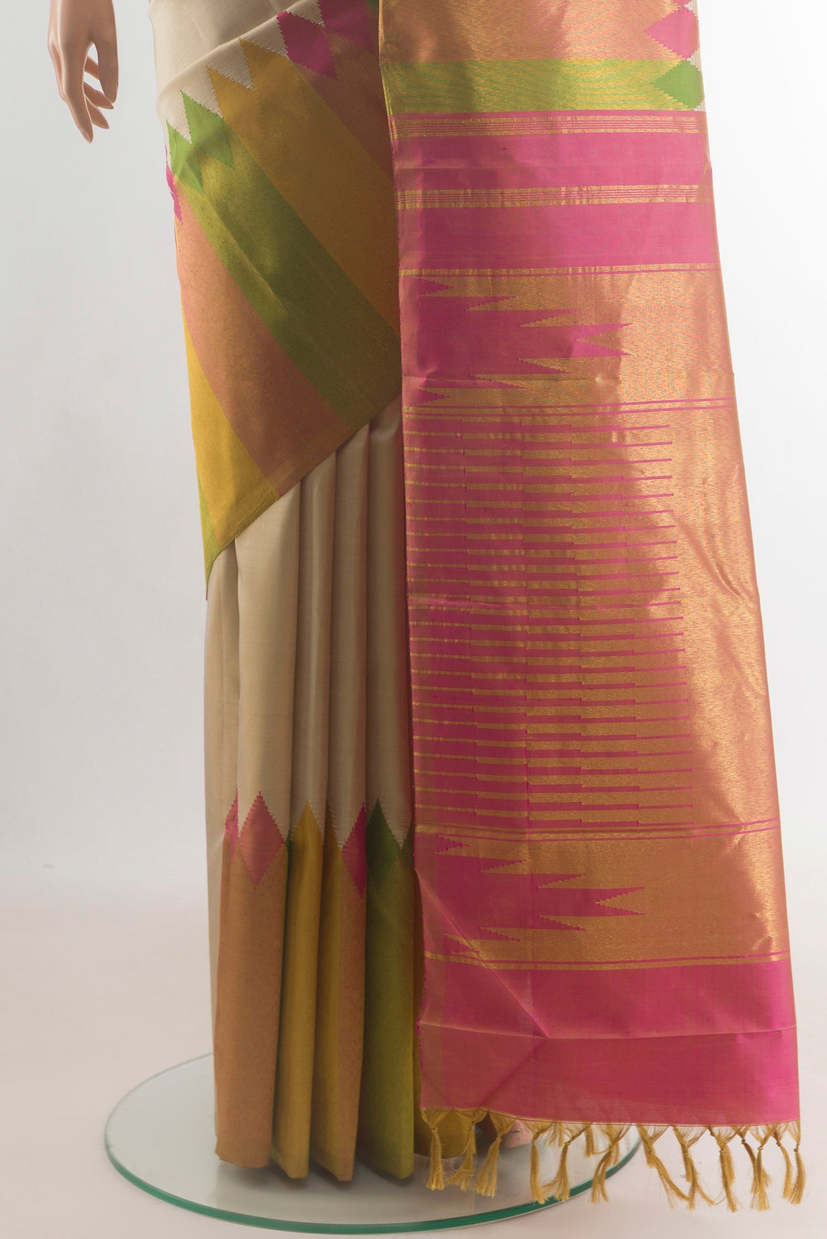 Pleats and pallu of Pure Silk Beige Kanjivaram Saree with Plain Body and Fancy Border. 