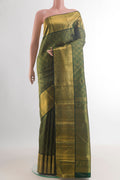 Pure Silk Bottle Green Kanchipuram Saree with Zari Brocade on the body and Zari Border.  displayed on a mannequin