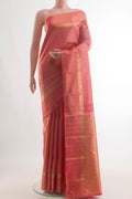 Pure Silk Coral Kanjivaram Saree with Zari Brocade on the body and Zari Border.  displayed on a mannequin