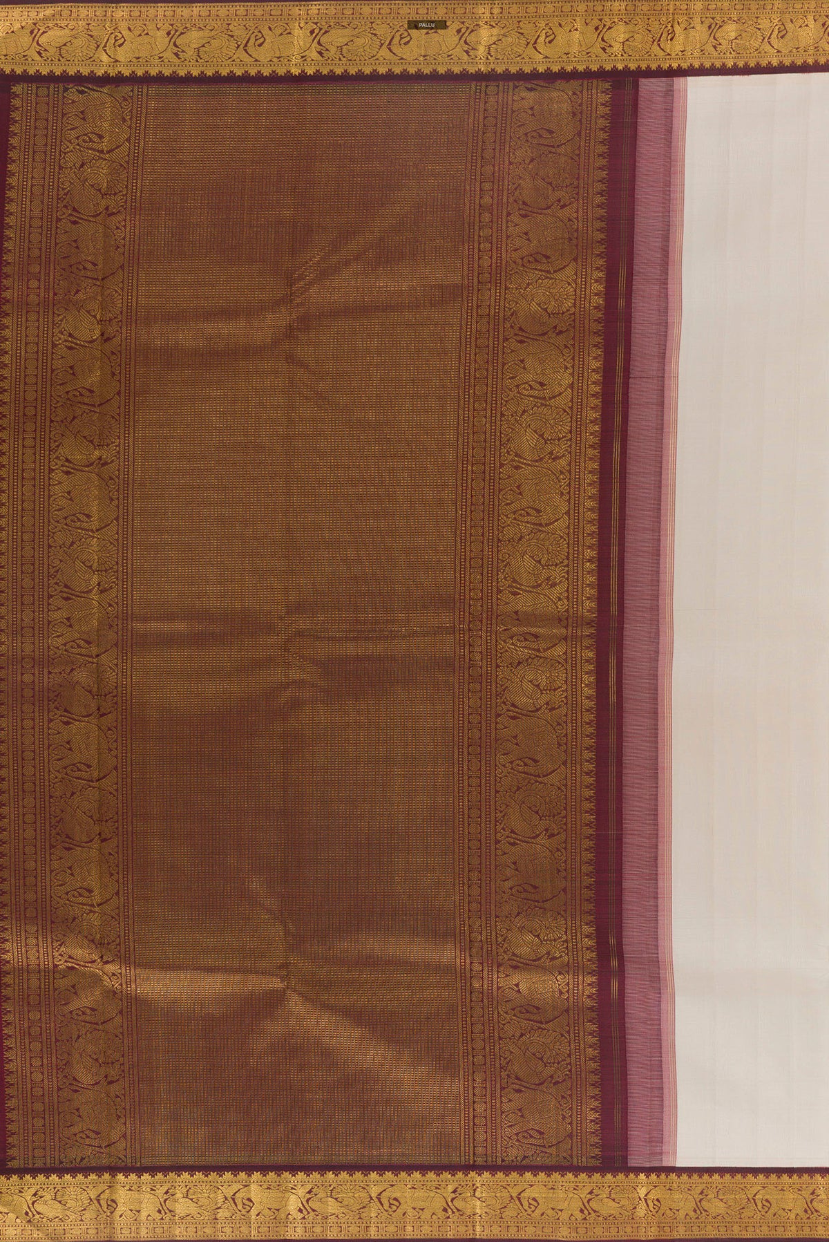 Close up image of the pallu of Pure Silk Off White Kanjivaram Saree with Plain Body and Zari Border. 