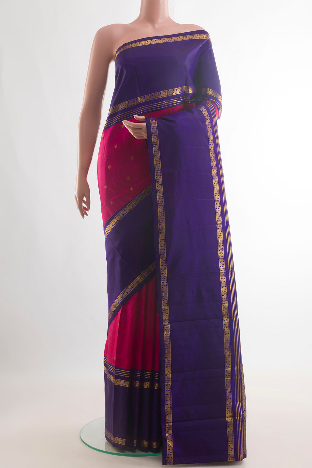 Pure Silk Pink Kanjivaram Saree with Zari Butta on the body and Zari Border.  displayed on a mannequin