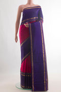 Pure Silk Pink Kanjivaram Saree with Zari Butta on the body and Zari Border.  displayed on a mannequin