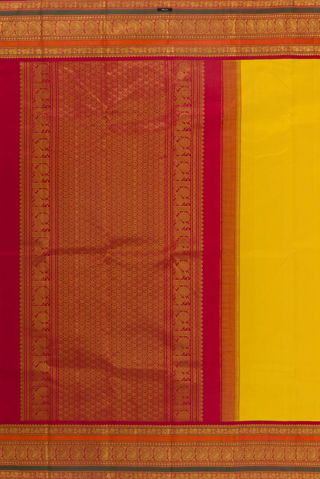 Close up image of the pallu of Pure Silk Yellow Kanjivaram Saree with Plain Body and Zari Border. 