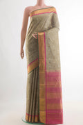 Pure Silk Beige Kanjivaram Saree with Jacquard design on the body and Zari Border.  displayed on a mannequin