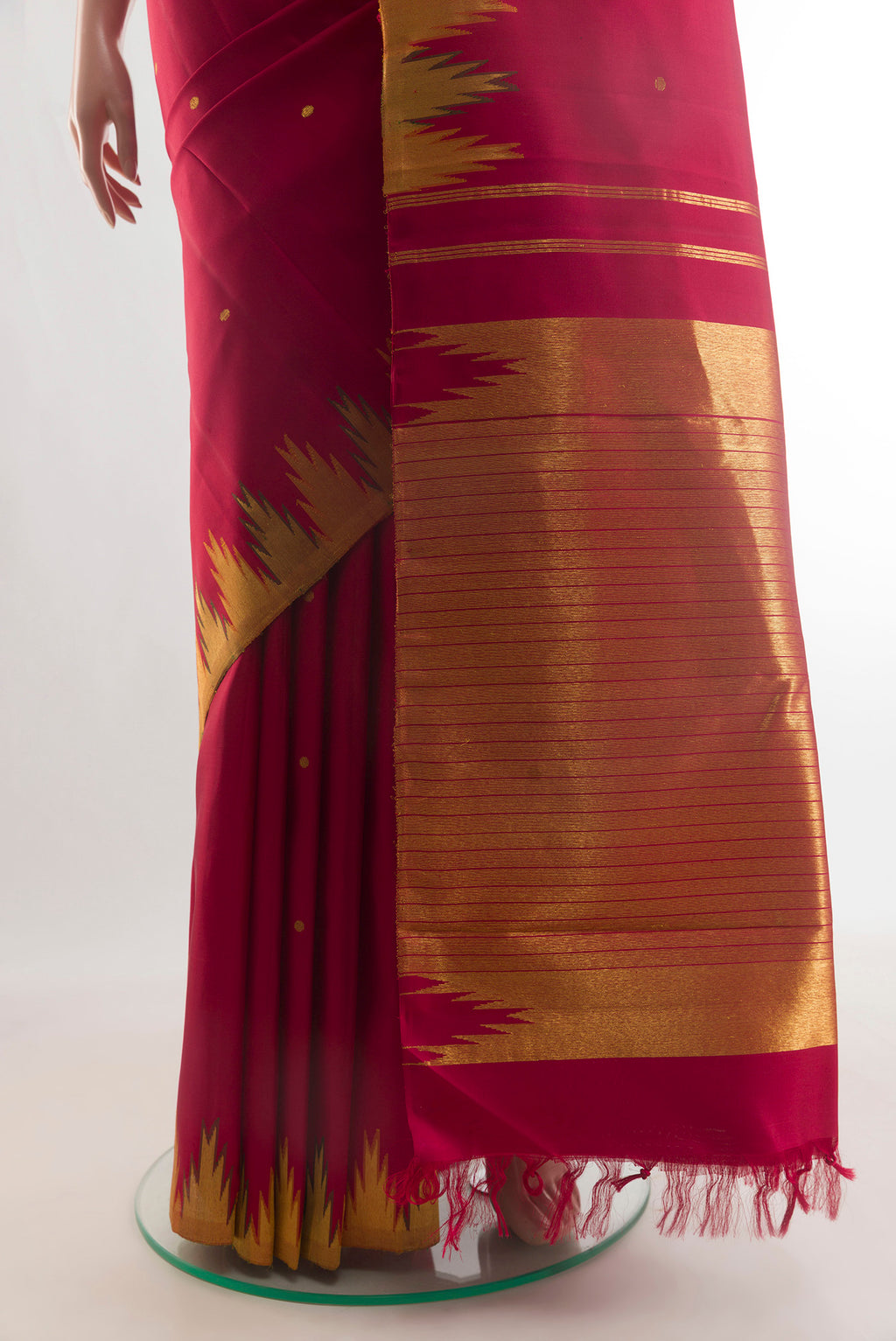 Pleats and pallu of Pure Silk Red Kanchipuram Saree with Zari Butta on the body and Temple Border. 