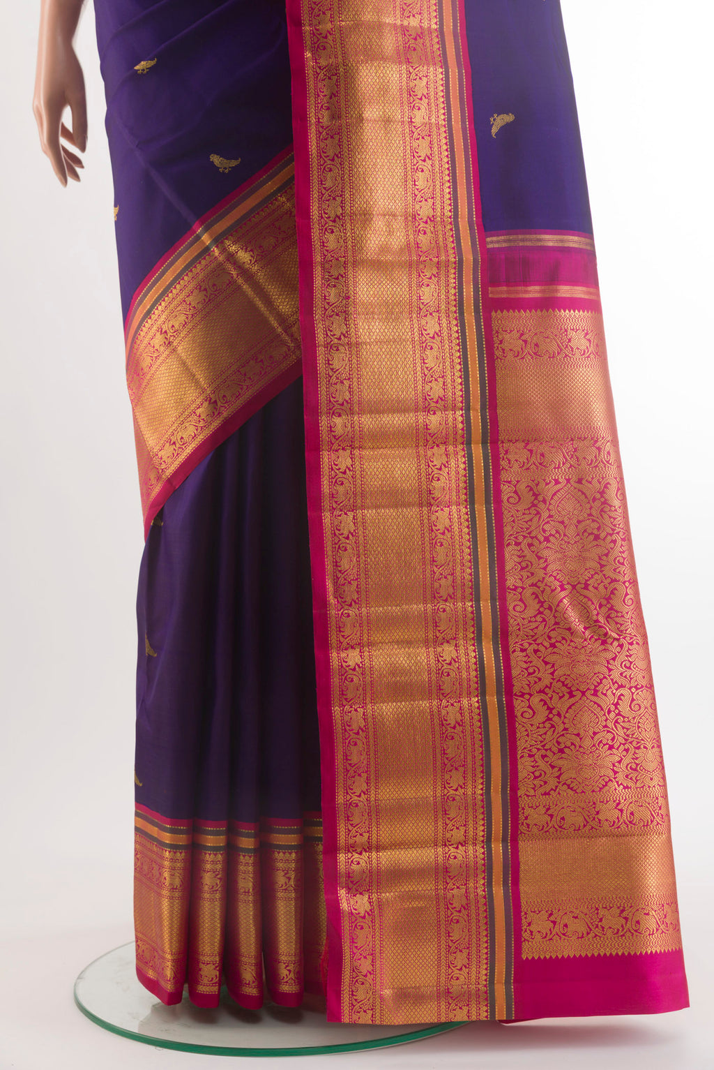 Pleats and pallu of Pure Silk Pure Zari Navy Blue Kanchipuram Saree with Zari Butta on the body and Zari Border. 
