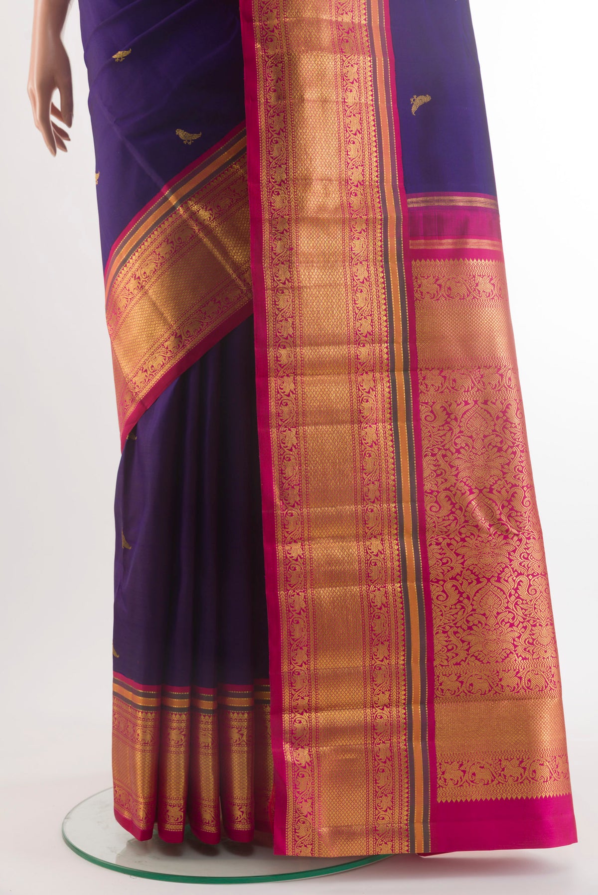 Pleats and pallu of Pure Silk Pure Zari Navy Blue Kanchipuram Saree with Zari Butta on the body and Zari Border. 