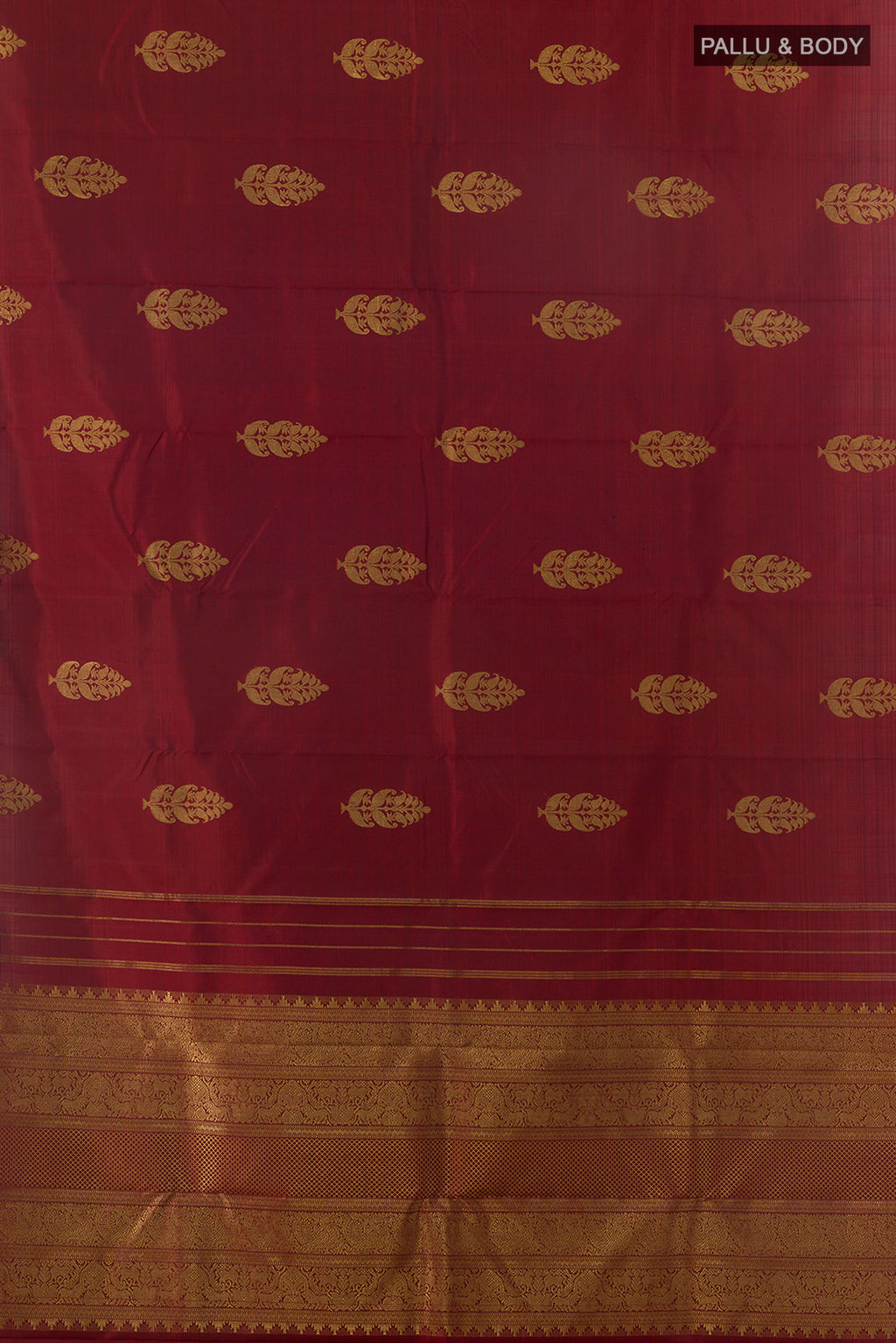 Flat view of Pure Silk Rust Kanjivaram Saree with Zari Butta on the body and Without Border. 