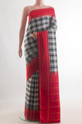 Pure Silk Pure Zari Off White Kanjivaram Saree with Checked design on the body and Zari Border.  displayed on a mannequin