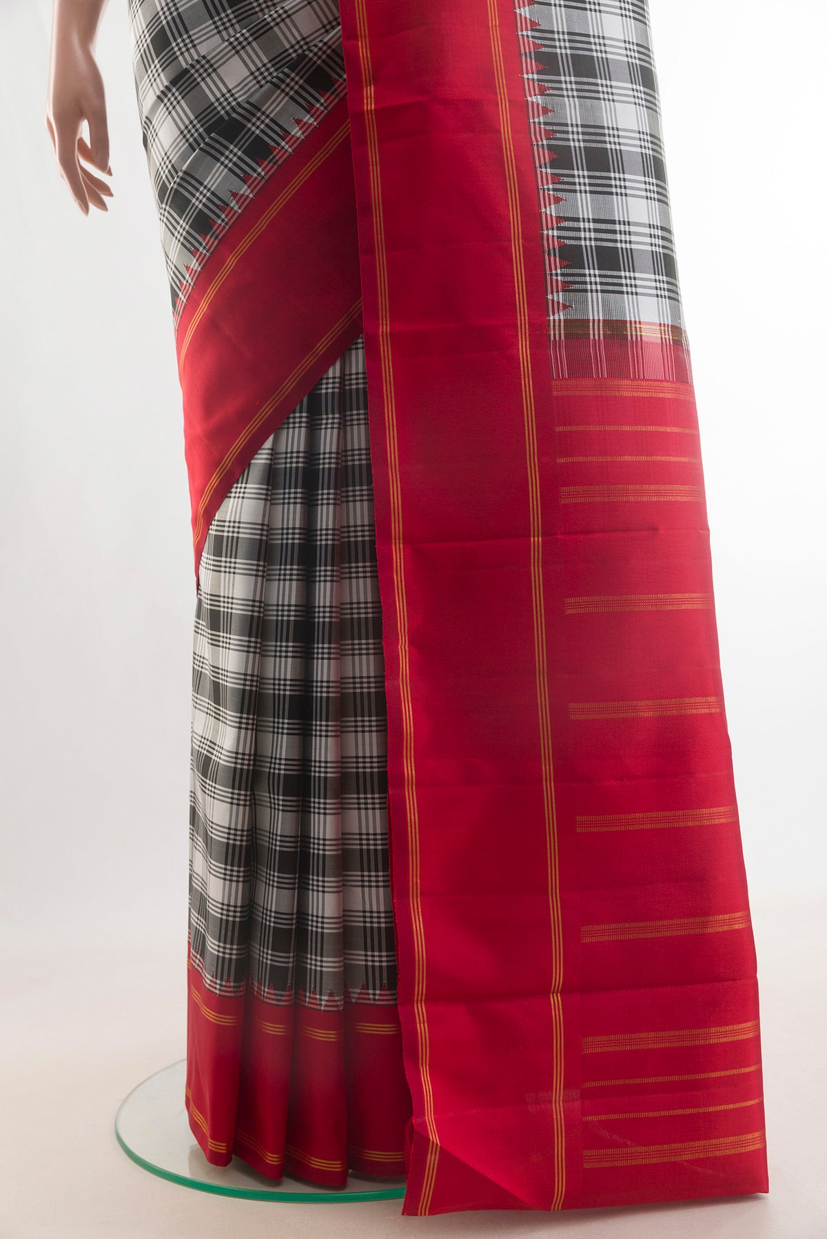 Pleats and pallu of Pure Silk Pure Zari Off White Kanjivaram Saree with Checked design on the body and Zari Border. 