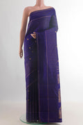 Pure Silk Blue Kanjivaram Saree with Zari Butta on the body and Zari Border.  displayed on a mannequin