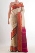 Pure Silk Cream Kanjivaram Saree with Plain Body and Zari Border.  displayed on a mannequin