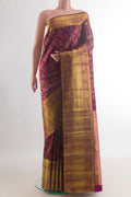 Pure Silk Purple Kanchipuram Saree with Zari Brocade on the body and Zari Border.  displayed on a mannequin