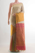 Pure Silk Beige Kanchipuram Saree with Plain Body and Temple Border.  displayed on a mannequin