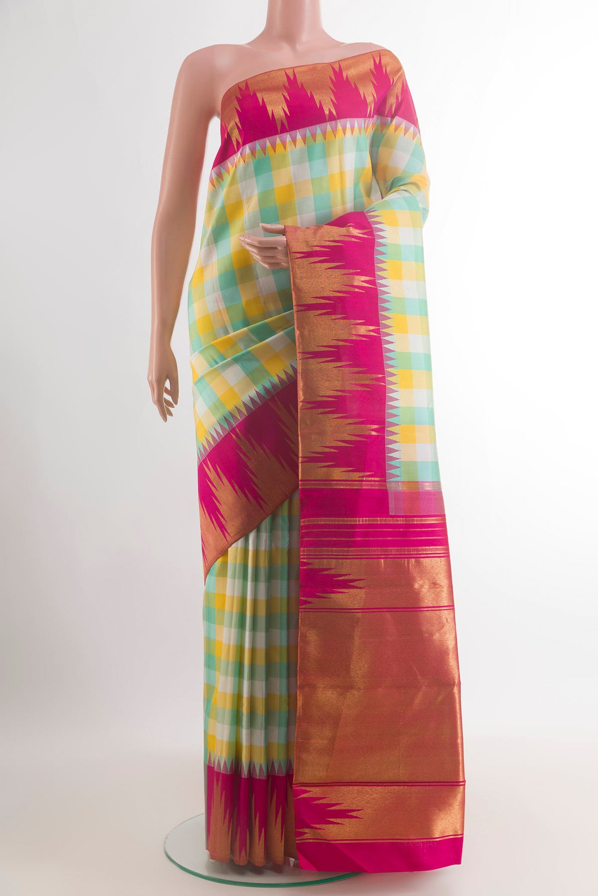 Pure Silk Multi Color Kanchipuram Saree with Checked design on the body and Temple Border.  displayed on a mannequin