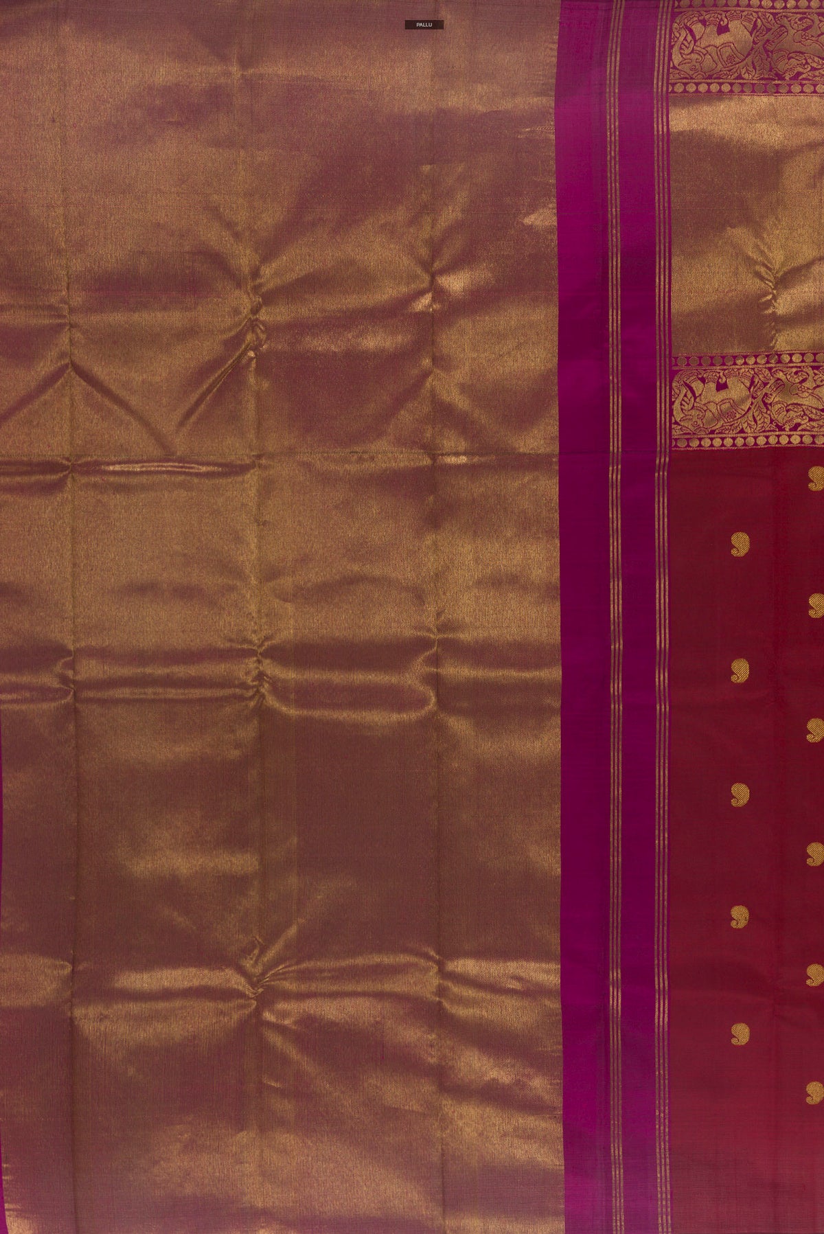 Close up image of the pallu of Pure Silk Maroon Kanchipuram Saree with Zari Butta on the body and Zari Border. 