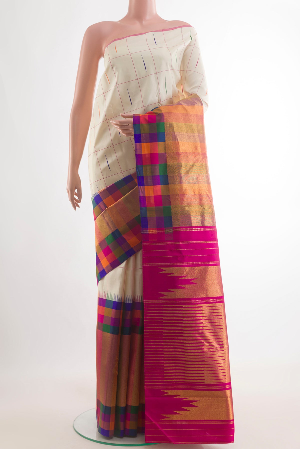 Pure Silk Off White Kanchipuram Saree with Checked design on the body and Skirt Border.  displayed on a mannequin