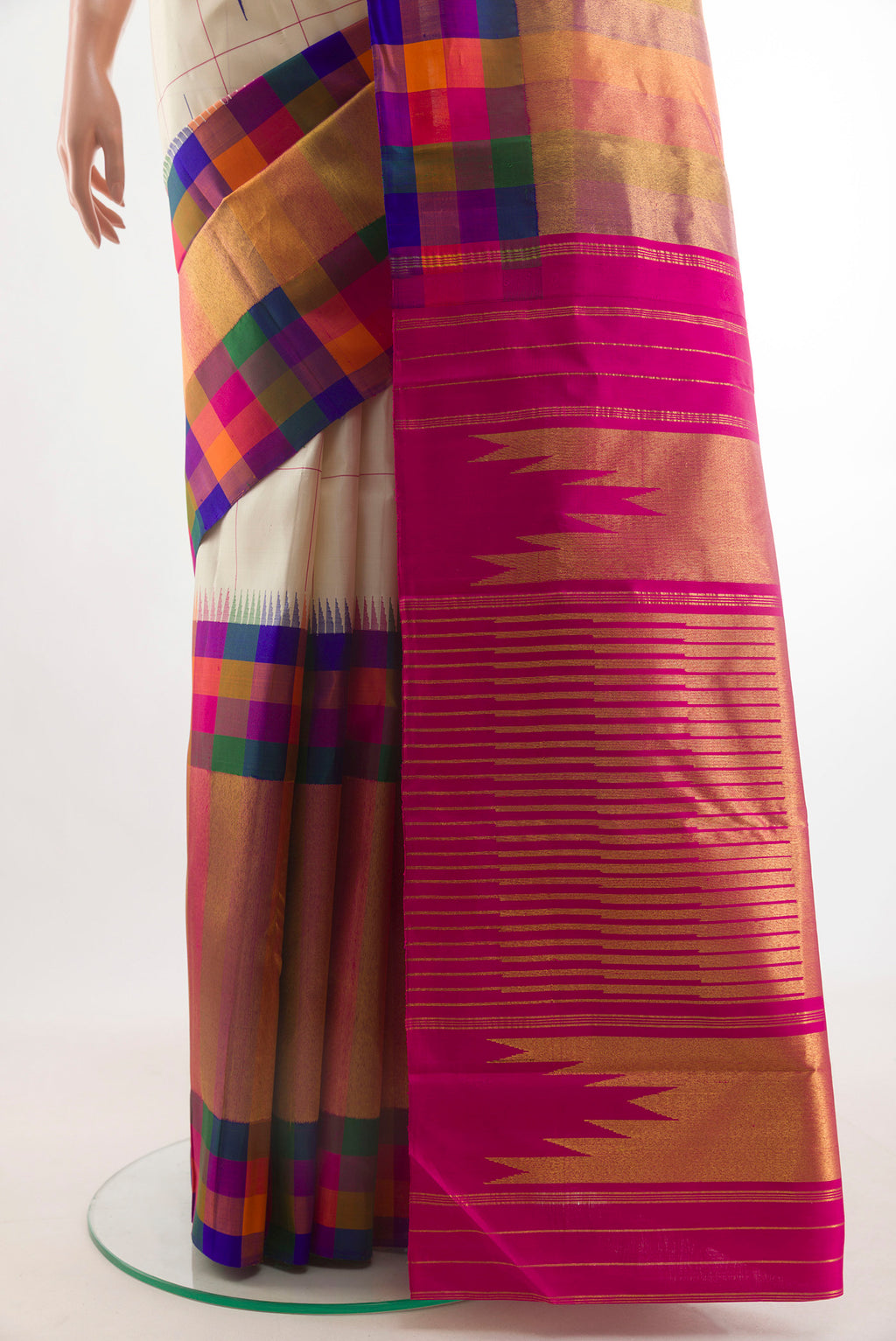 Pleats and pallu of Pure Silk Off White Kanchipuram Saree with Checked design on the body and Skirt Border. 