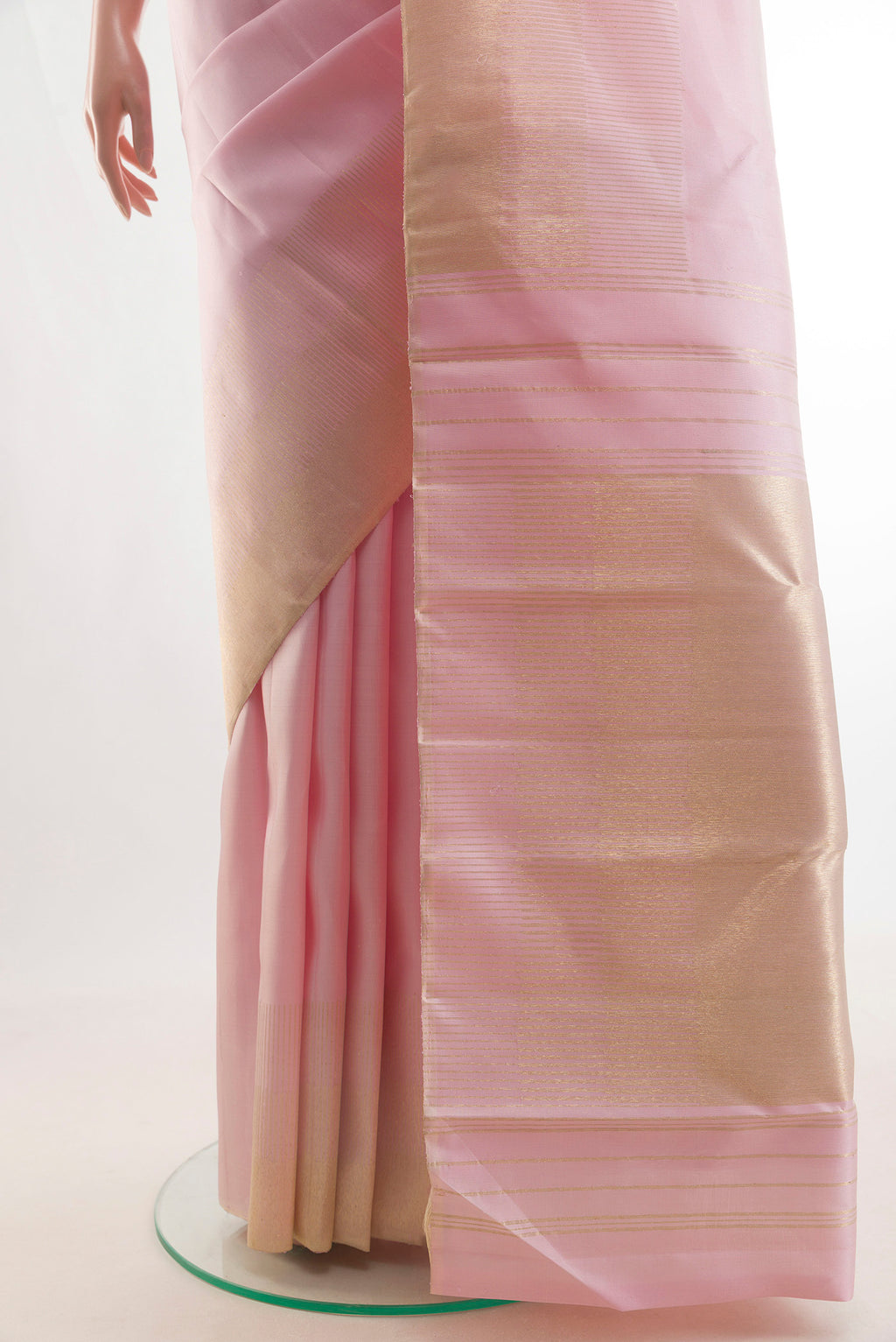 Pleats and pallu of Pure Silk Rose pink Kanjivaram Saree with Plain Body and Zari Border. 