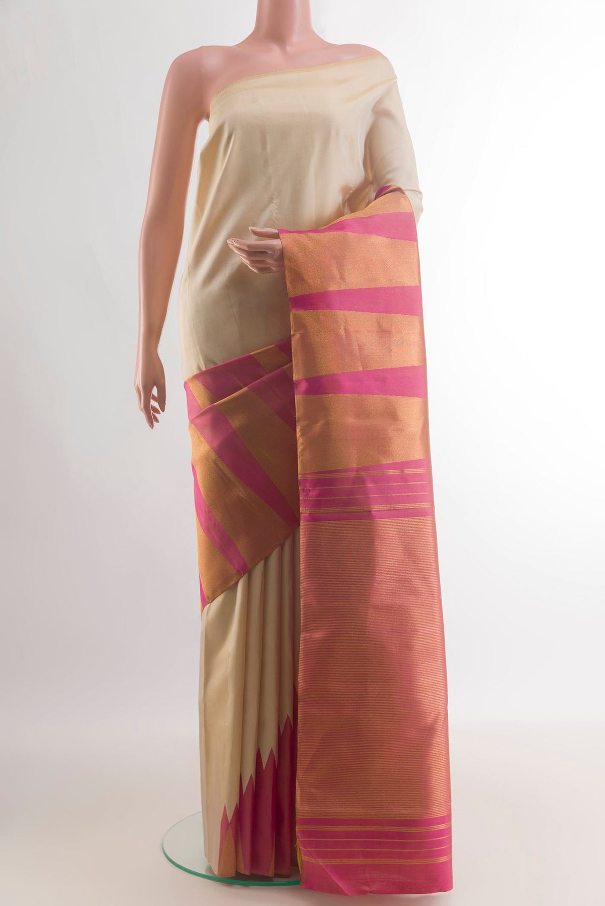 Pure Silk Cream Kanjivaram Saree with Plain Body and Rising Temple Border.  displayed on a mannequin