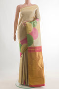 Pure Silk Beige Kanchipuram Saree with Plain Body and Fancy Border.  displayed on a mannequin