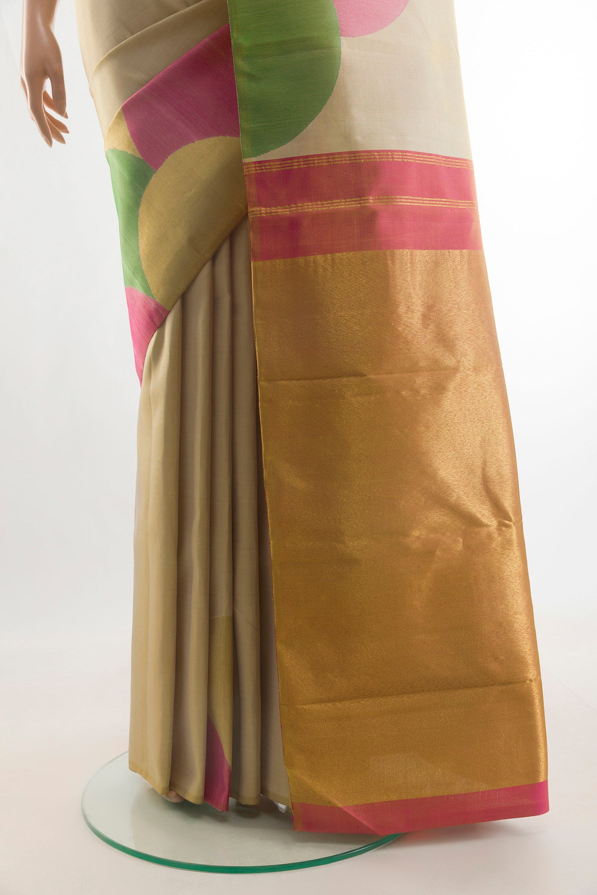 Pleats and pallu of Pure Silk Beige Kanchipuram Saree with Plain Body and Fancy Border. 