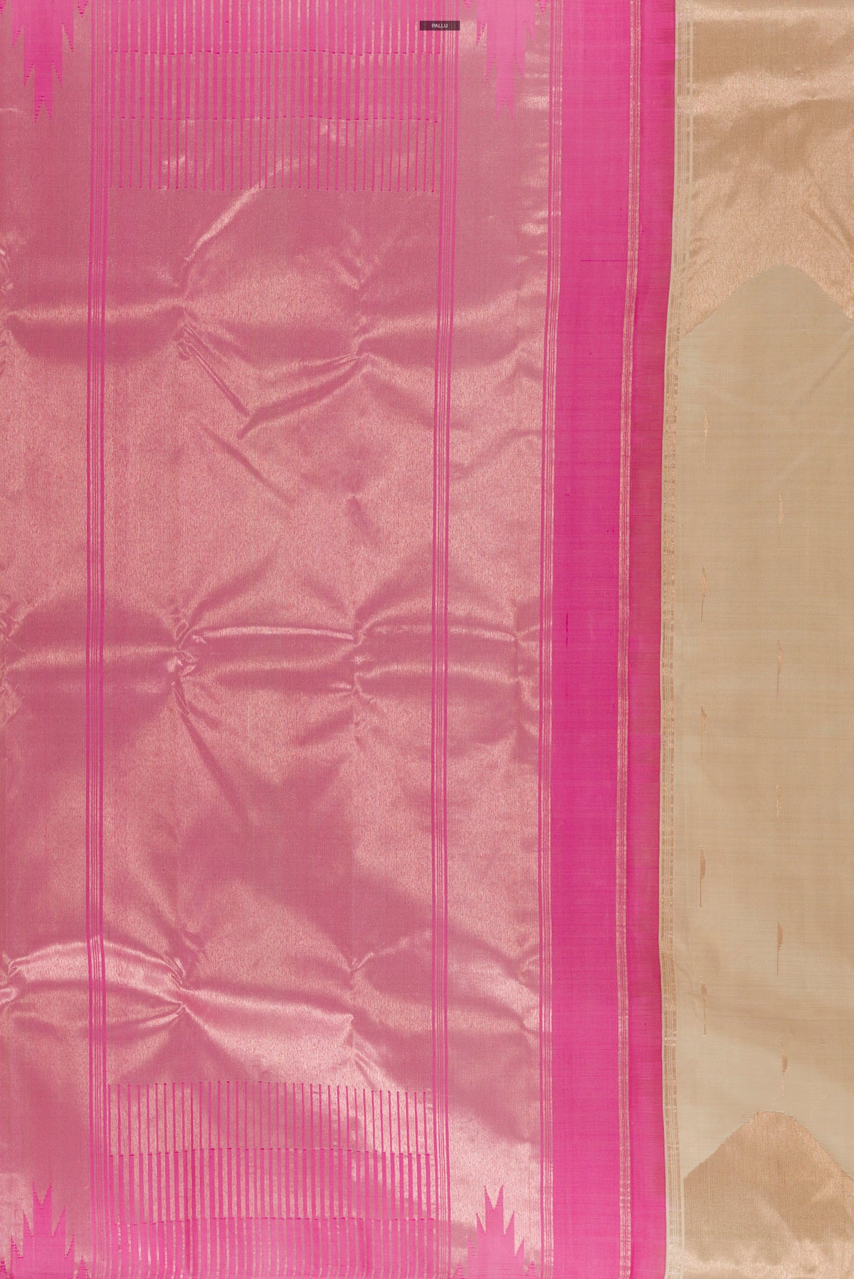 Close up image of the pallu of Pure Silk Beige Kanchipuram Saree with Zari Butta on the body and Zari Border. 