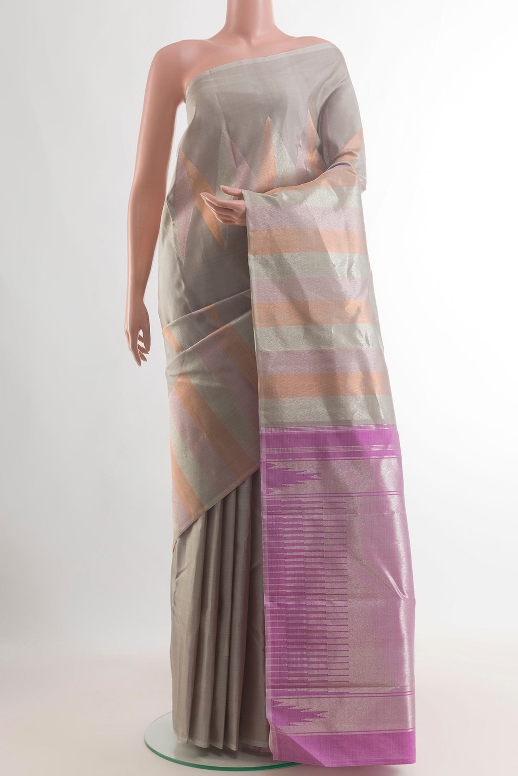 Pure Silk Beige Kanchipuram Saree with Zig Zag design on the body and Without Border.  displayed on a mannequin