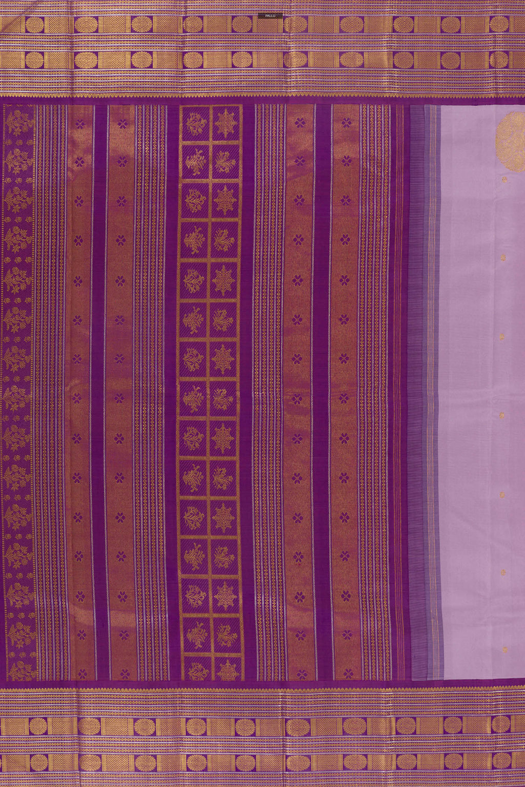 Close up image of the pallu of Pure Silk Lavender Kanjivaram Saree with Zari Butta on the body and Zari Border. 