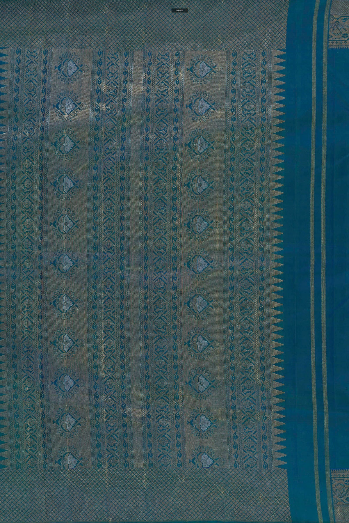 Close up image of the pallu of Pure Silk Blue Kanchipuram Saree with Zari Butta on the body and Zari Border. 