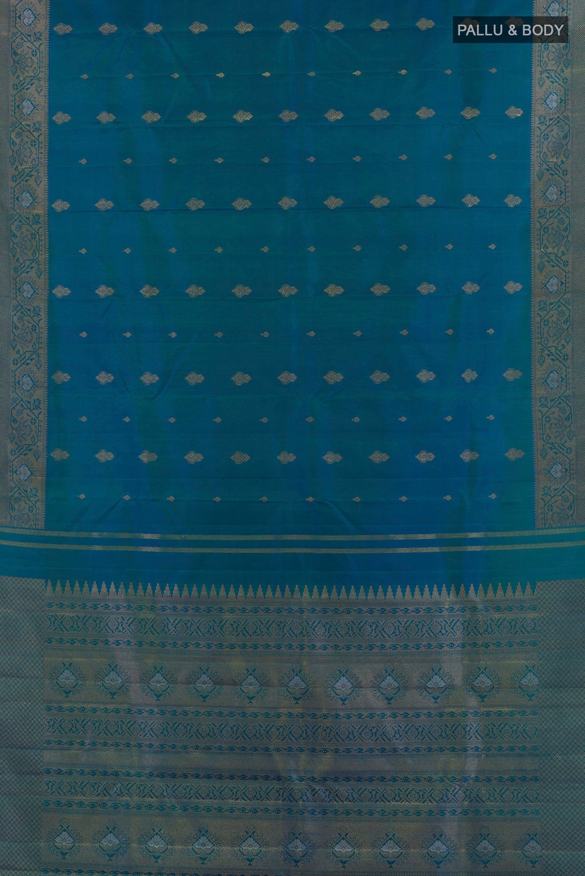 Flat view of Pure Silk Blue Kanchipuram Saree with Zari Butta on the body and Zari Border. 