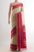 Pure Silk Off White Kanchipuram Saree with Zari Butta on the body and Zari Border.  displayed on a mannequin