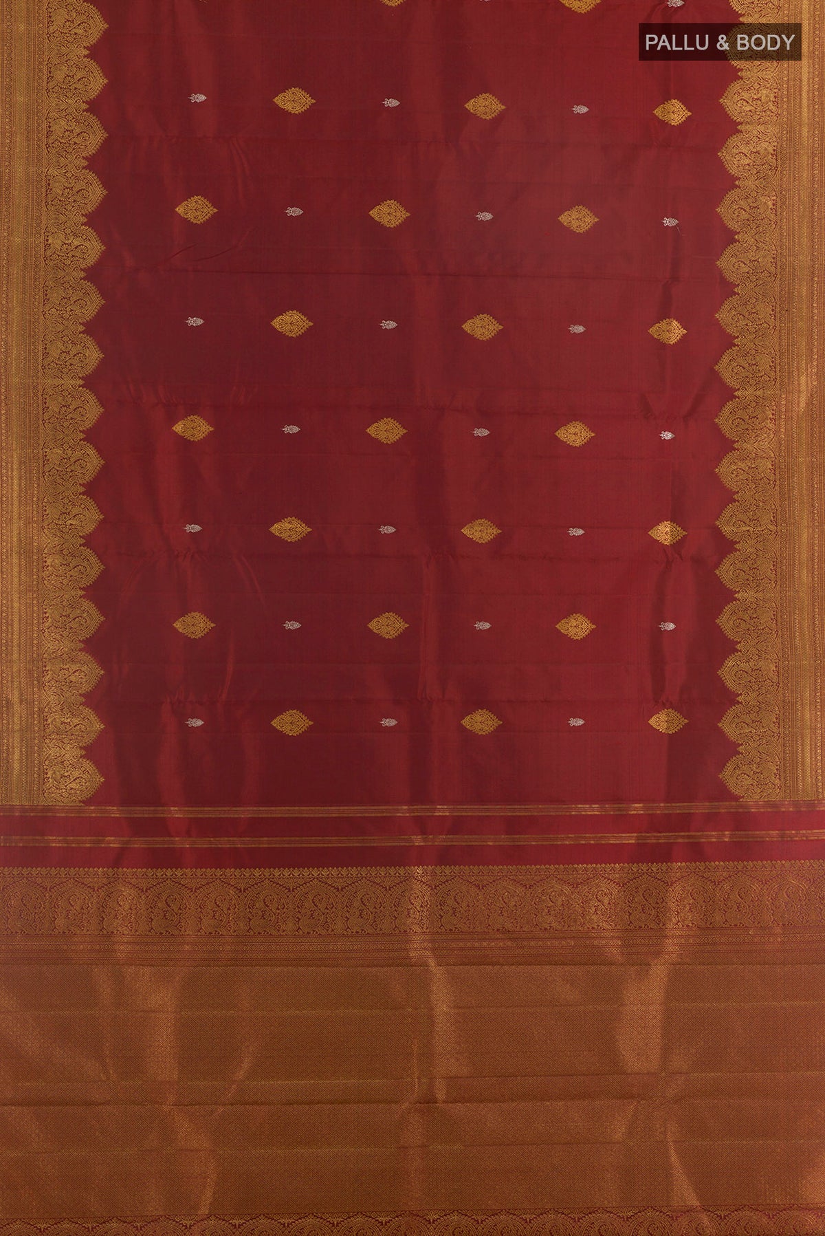 Flat view of Pure Silk Maroon Kanjivaram Saree with Zari Butta on the body and Zari Border. 