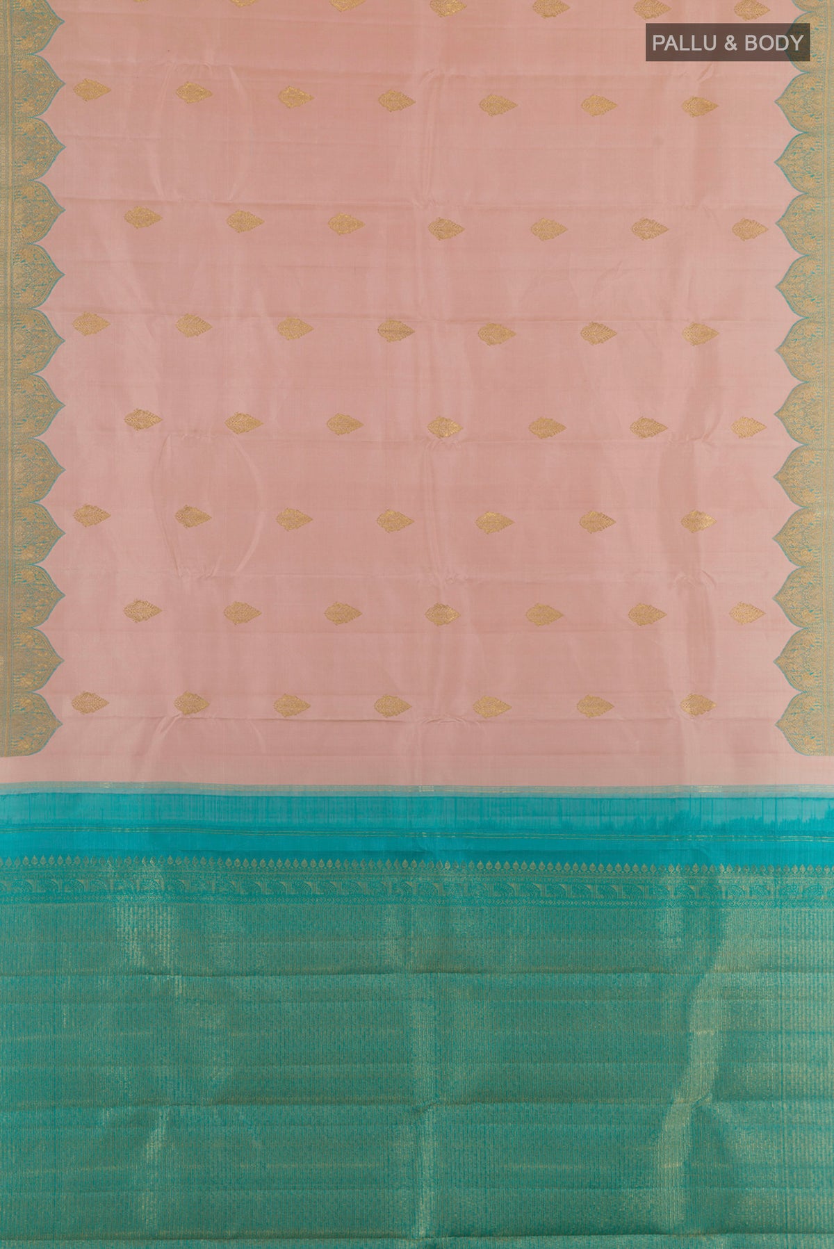 Flat view of Pure Silk Rose Gold Kanjivaram Saree with Zari Butta on the body and Zari Border. 