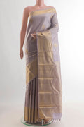 Pure Silk Lavender Kanjivaram Saree with Jacquard With Zari Butta on the body and Zari Border.  displayed on a mannequin