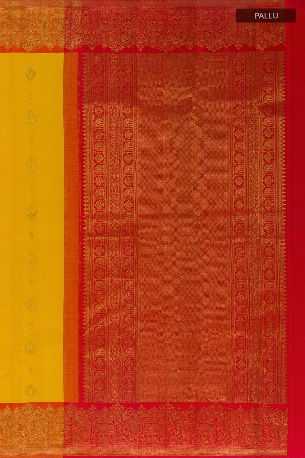 Close up image of the pallu of Pure Silk Yellow Kanjivaram Saree with Zari Butta on the body and Zari Border. 