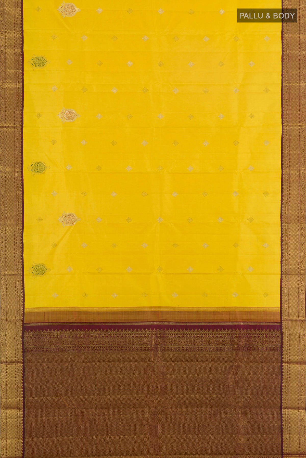 Flat view of Pure Silk Yellow Kanjivaram Saree with Zari Butta on the body and Zari Border. 