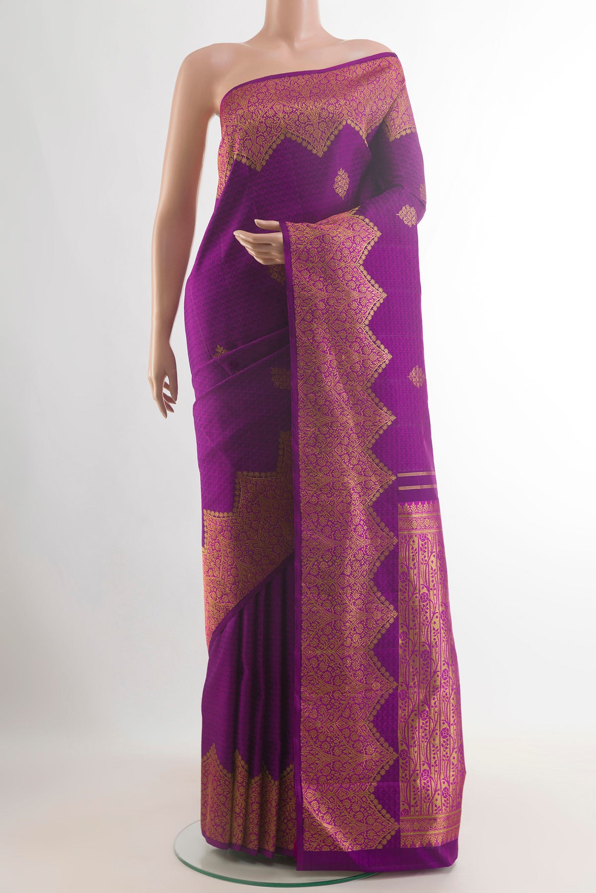Pure Silk Purple Kanchipuram Saree with Jacquard With Zari Butta on the body and Zari Border.  displayed on a mannequin