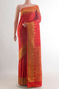Pure Silk Red Kanjivaram Saree with Zari Butta on the body and Zari Border.  displayed on a mannequin