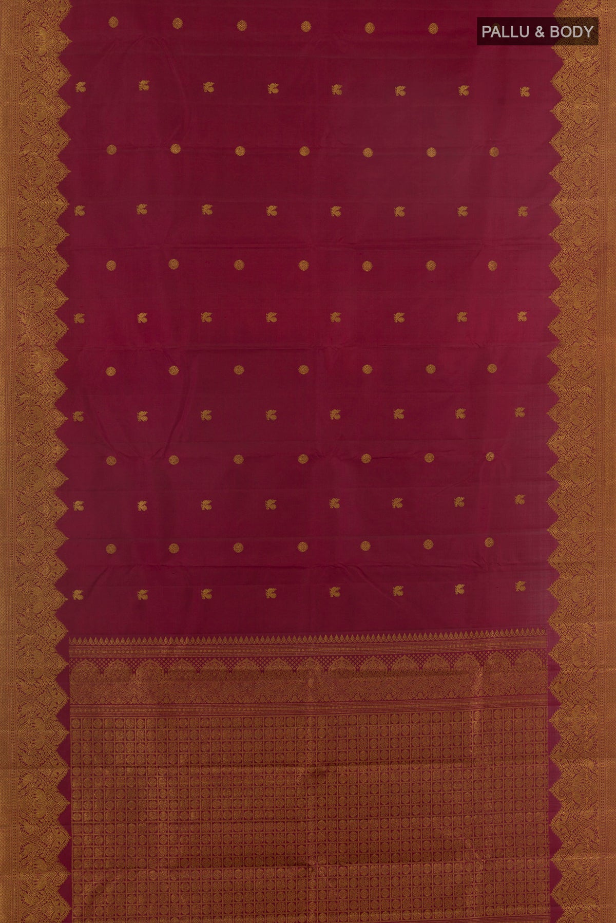 Flat view of Pure Silk Maroon Kanjivaram Saree with Zari Butta on the body and Zari Border. 