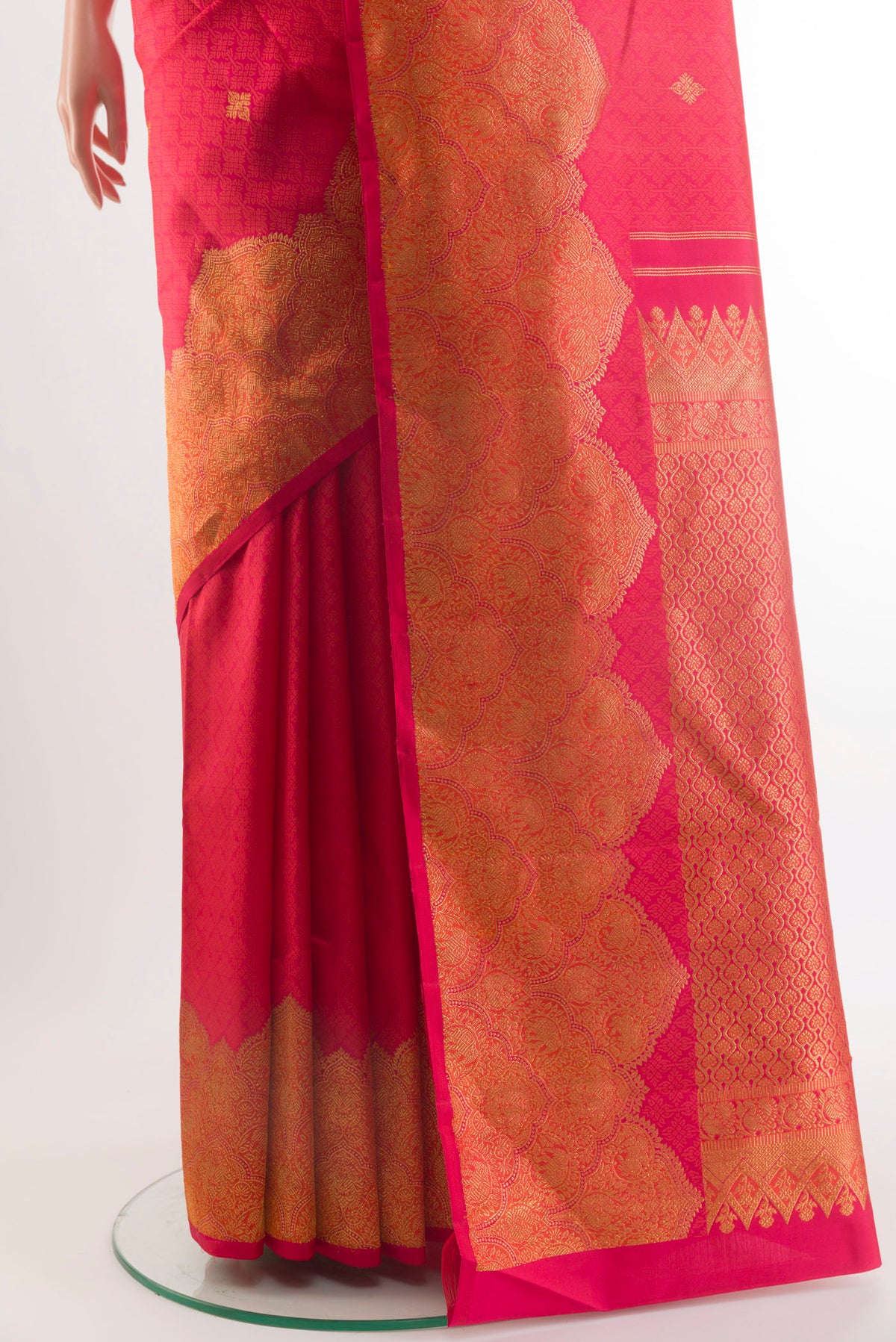 Pleats and pallu of Pure Silk Red Kanchipuram Saree with Jacquard With Zari Butta on the body and Fancy Border. 