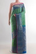 Pure Silk Green Kanchipuram Saree with Zari Brocade on the body and Zari Border.  displayed on a mannequin