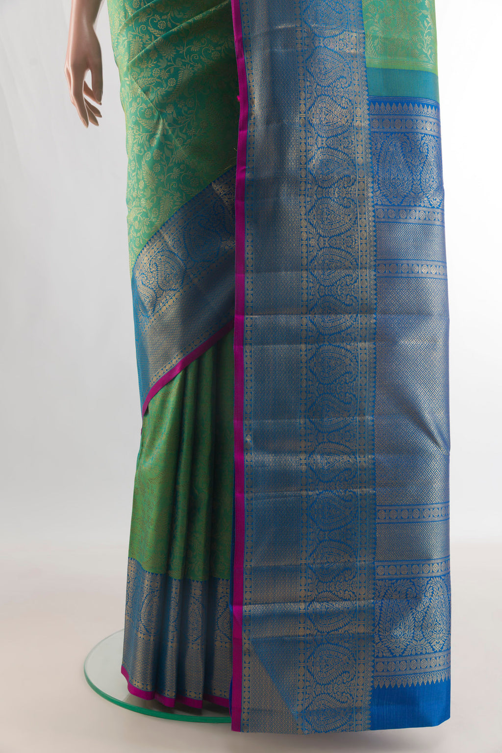 Pleats and pallu of Pure Silk Green Kanchipuram Saree with Zari Brocade on the body and Zari Border. 
