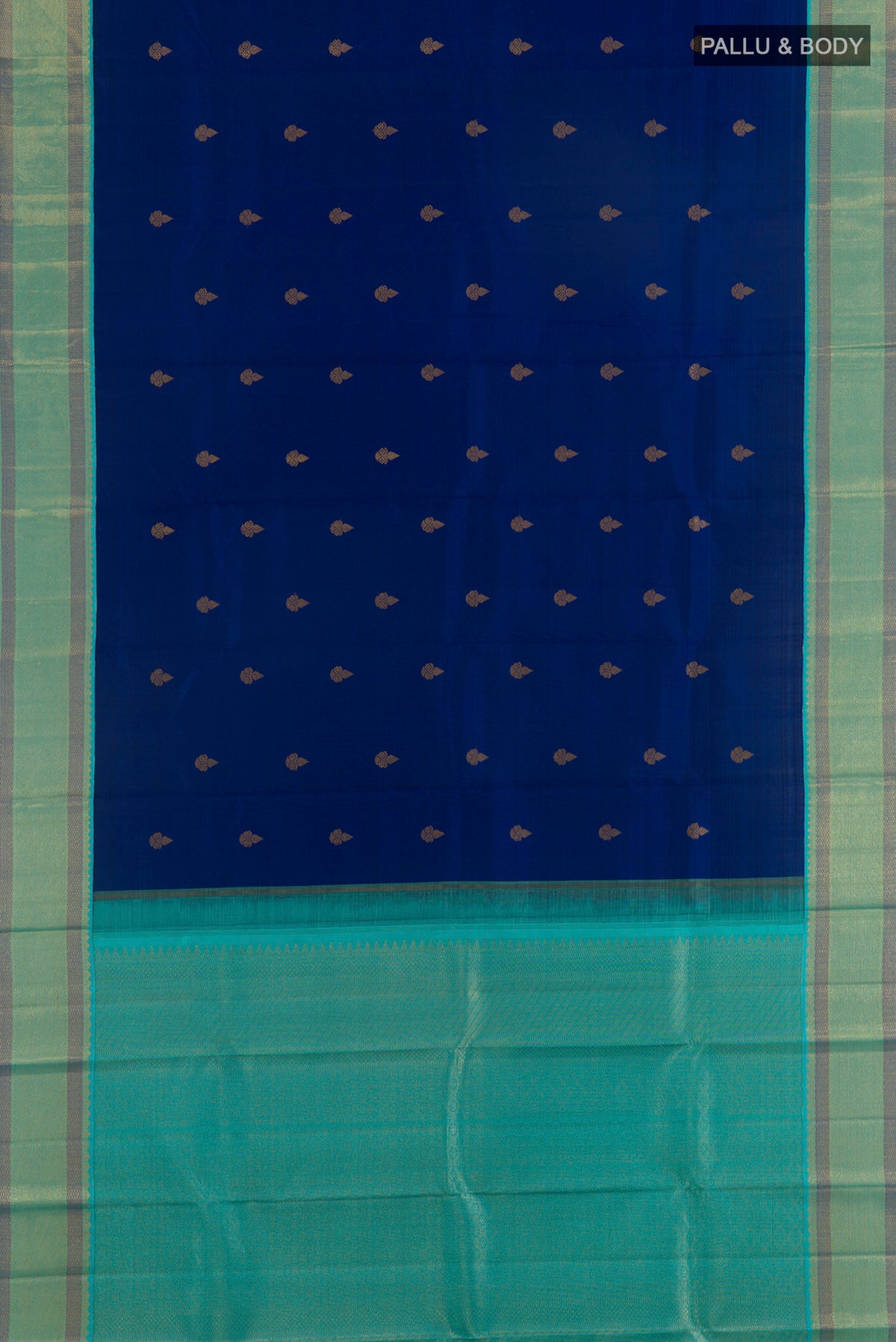Flat view of Pure Silk Blue Kanchipuram Saree with Zari Butta on the body and Zari Border. 