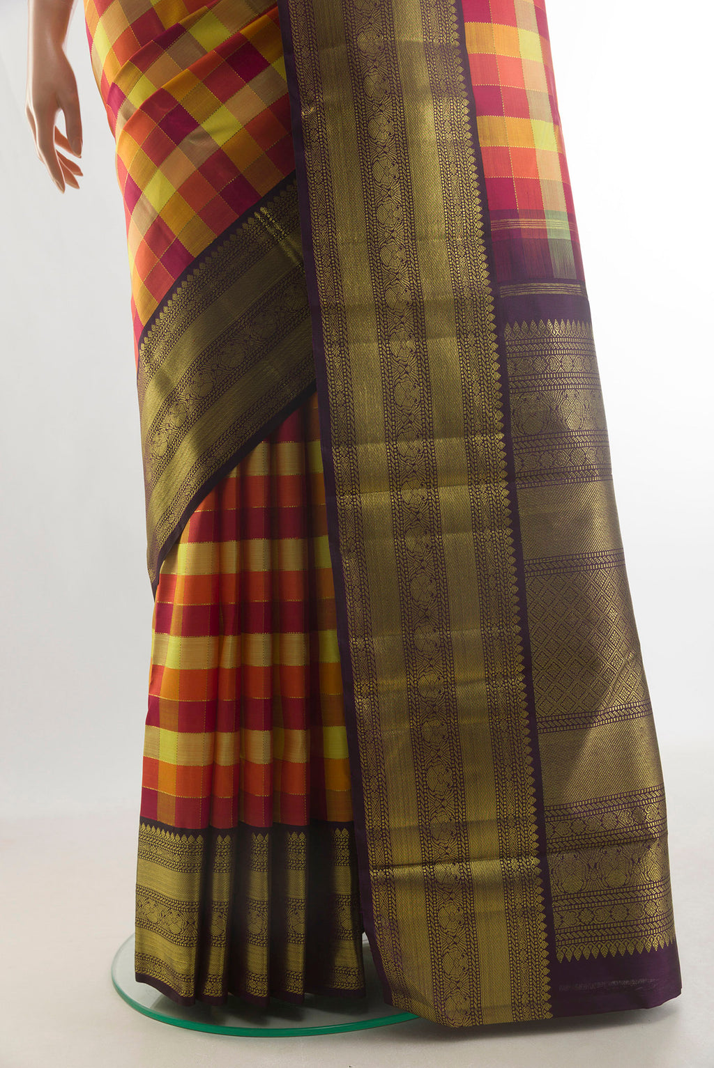 Pleats and pallu of Pure Silk Multi Color Kanchipuram Saree with Checked design on the body and Zari Border. 