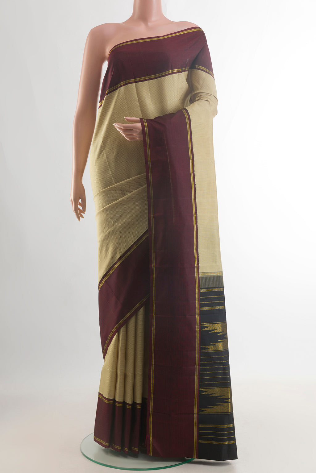 Pure Silk Sandal Kanjivaram Saree with Checked design on the body and Zari Border.  displayed on a mannequin