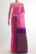 Pure Silk Pink Kanchipuram Saree with Zari Butta on the body and Zari Border.  displayed on a mannequin