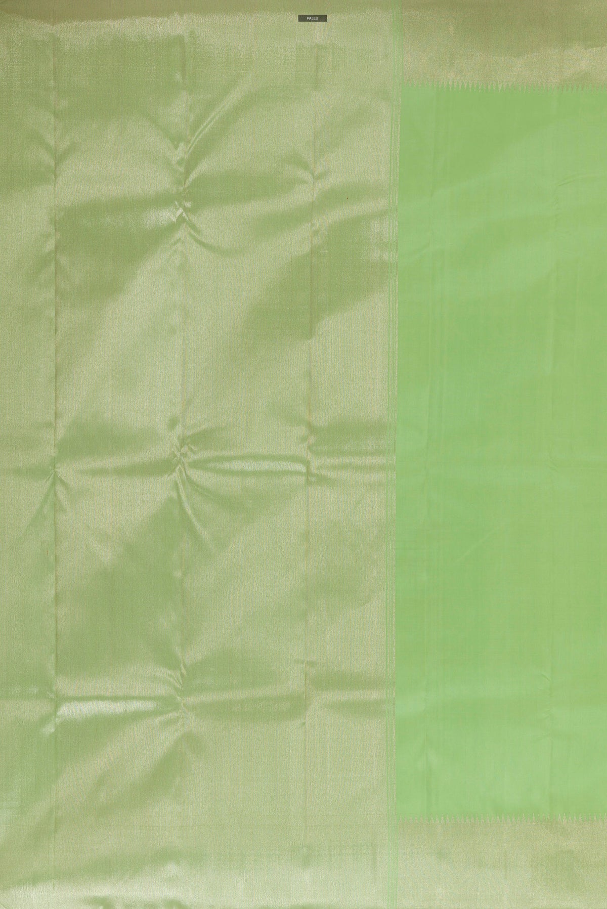 Close up image of the pallu of Pure Silk Pista Green Kanchipuram Saree with Plain Body and Zari Border. 