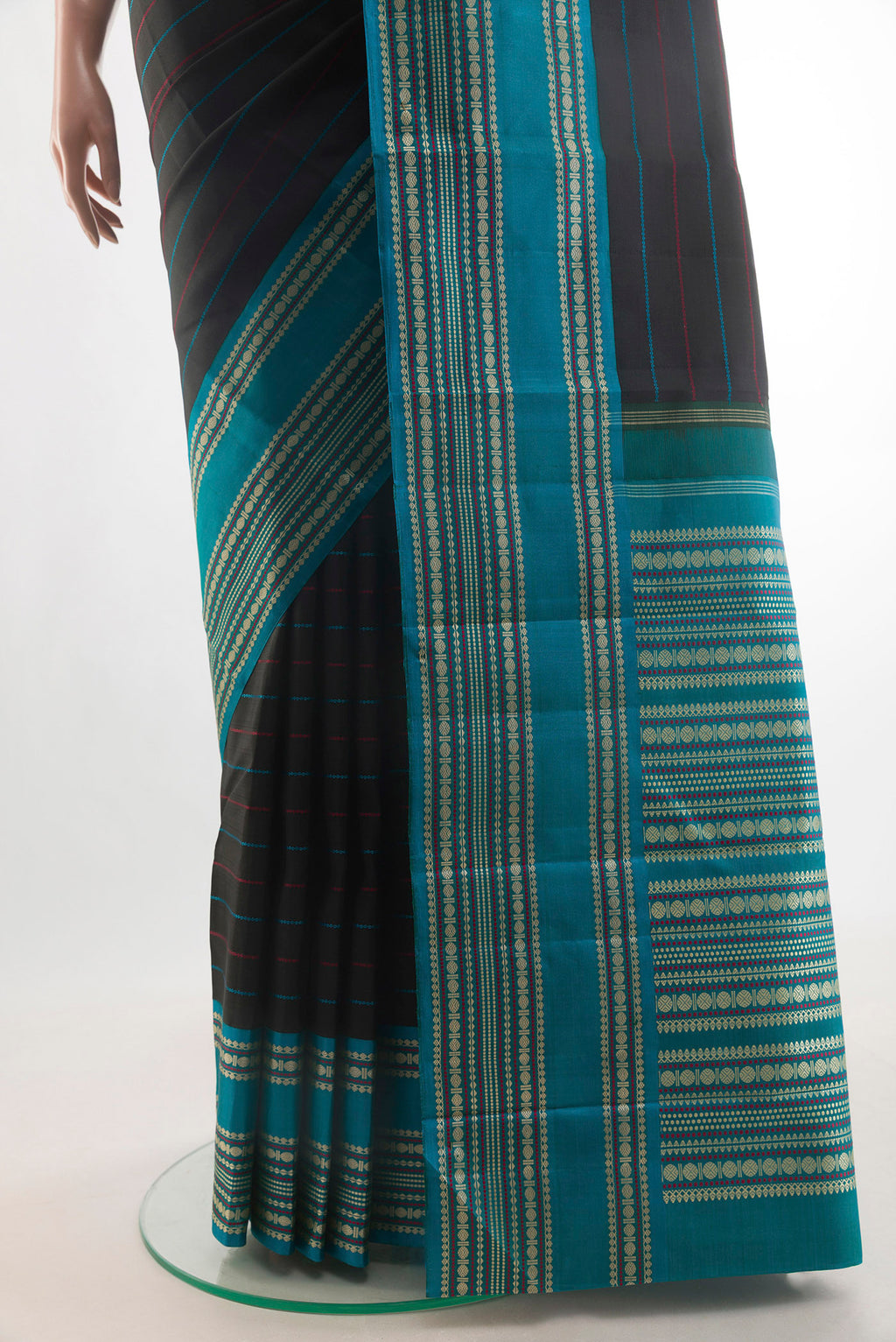 Pleats and pallu of Pure Silk Black Kanjivaram Saree with Stripes on the body and Thread Border. 